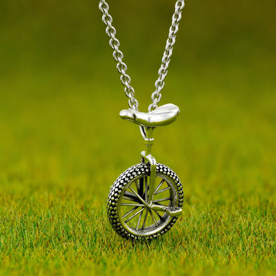 Gold unicycle | Necklace
